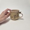 Ceramic blackbird mug in pink