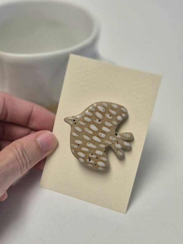 Bird brooch
