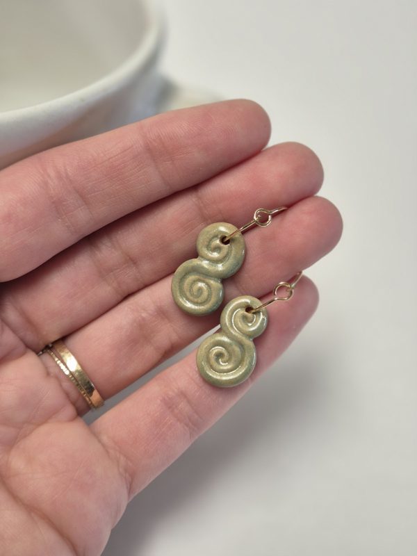 Green dangle earrings