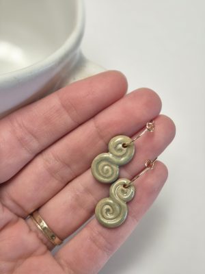 Green dangle earrings
