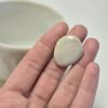 Wood fired ceramic ring in white