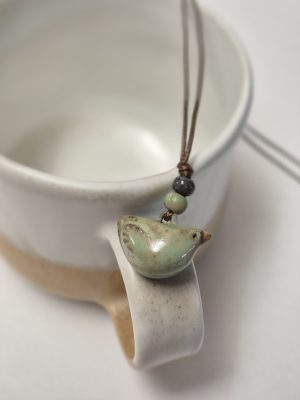Tiny bird pendant