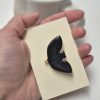 Black bird brooch