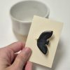 Black bird brooch