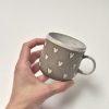 Coffee cup with hearts